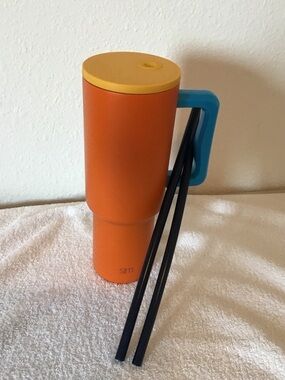 Simple Orange Travel Mug with Yellow Lid and Blue Handle